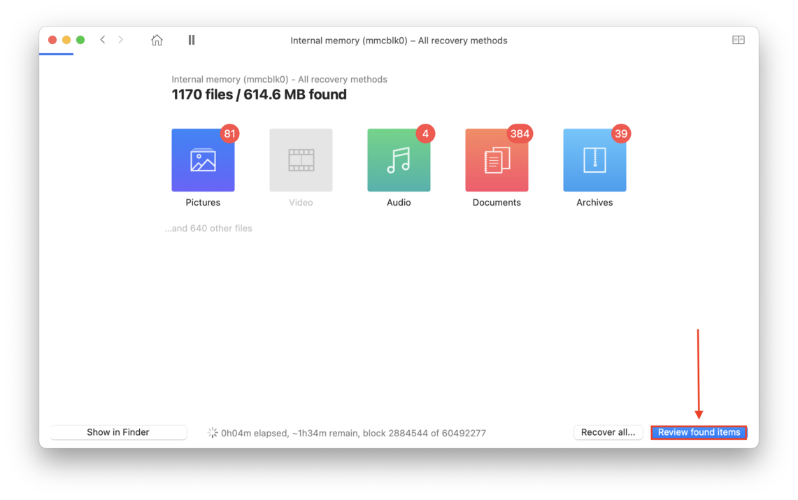 disk drill scanning window with a pointer towards the review found items button