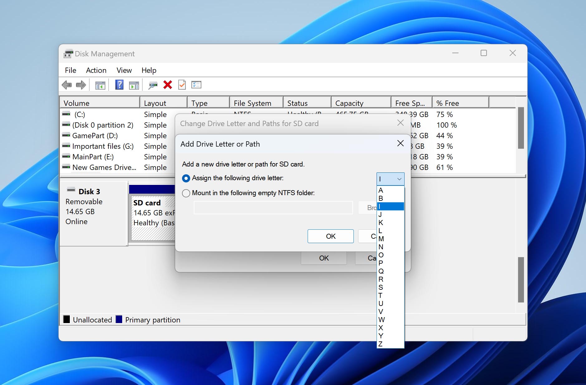 Select new letter for sd card and click ok
