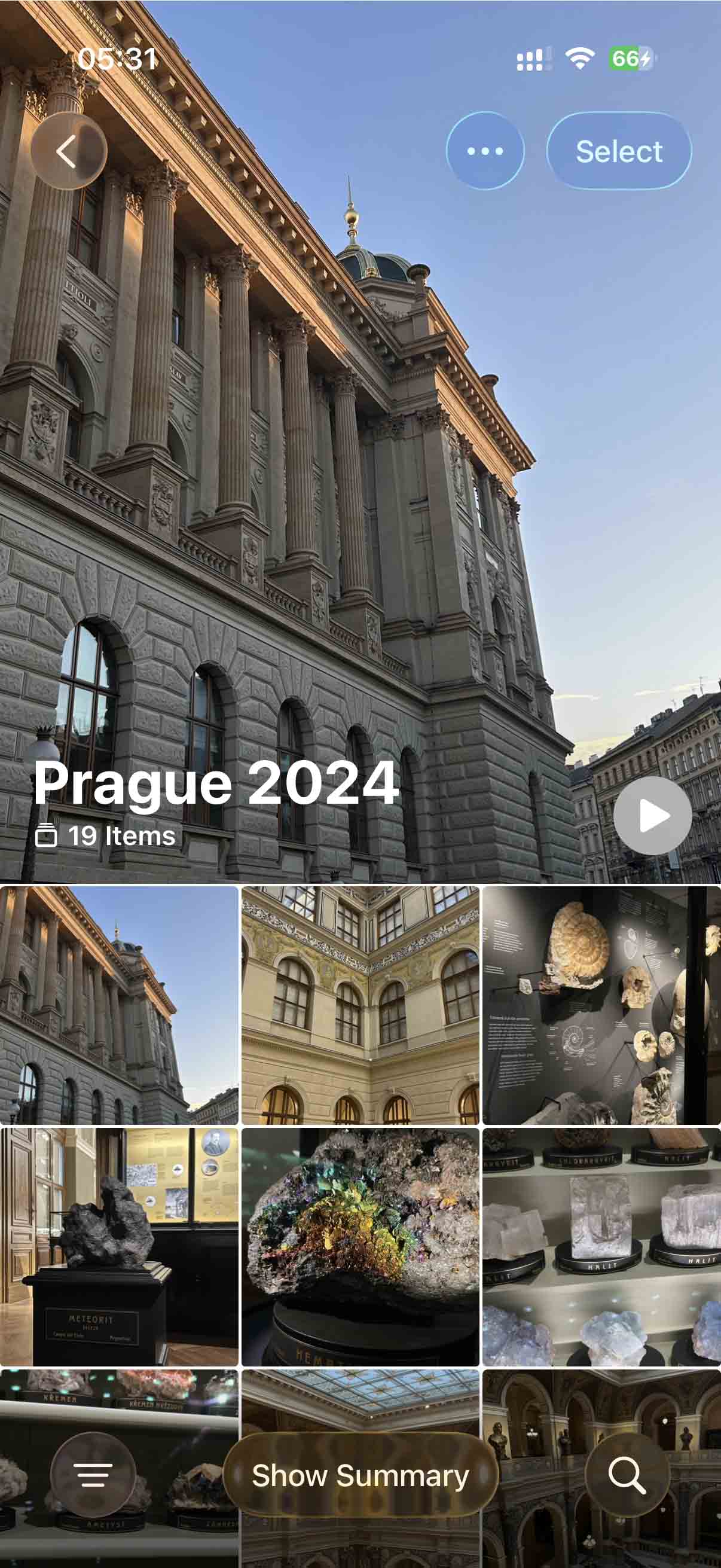 Tap Select in the Photos app.