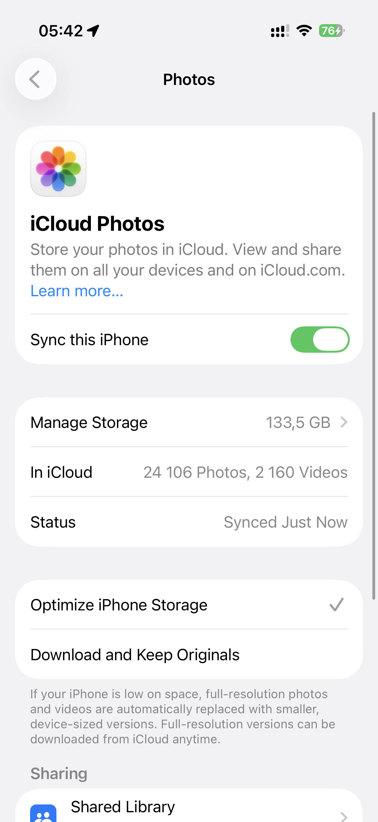 Turn off Sync this iPhone for iCloud Photos.