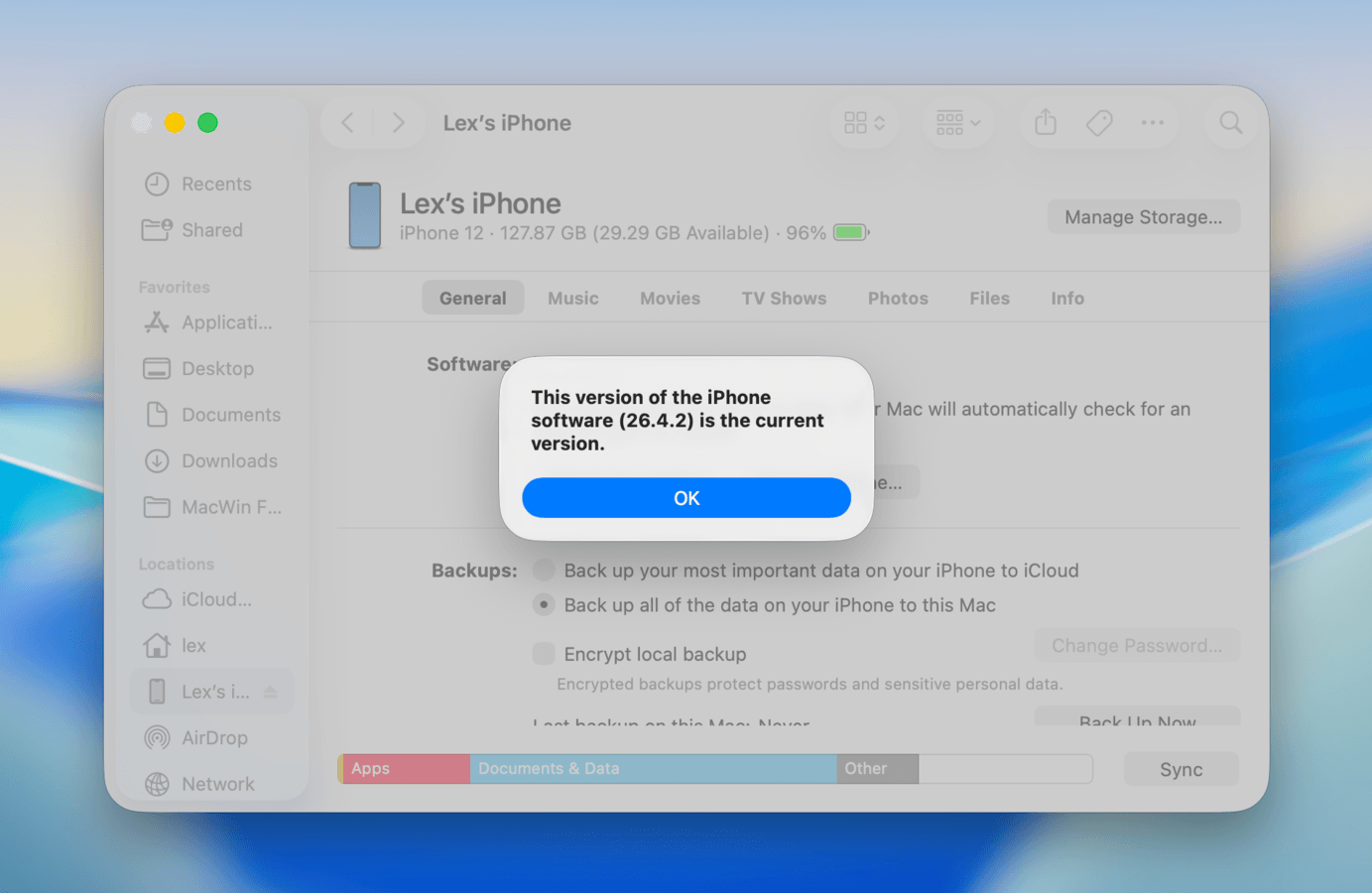 "Current version" confirmation dialog on a Mac attempting to update an iPhone's iOS