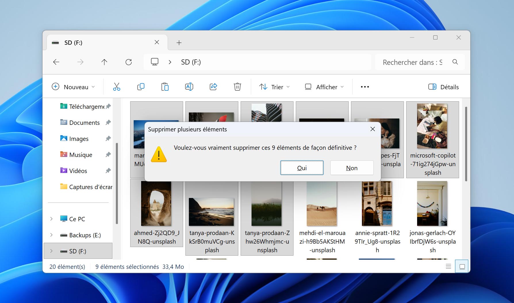 Suppression de photos d’une carte SD sur Windows 11.