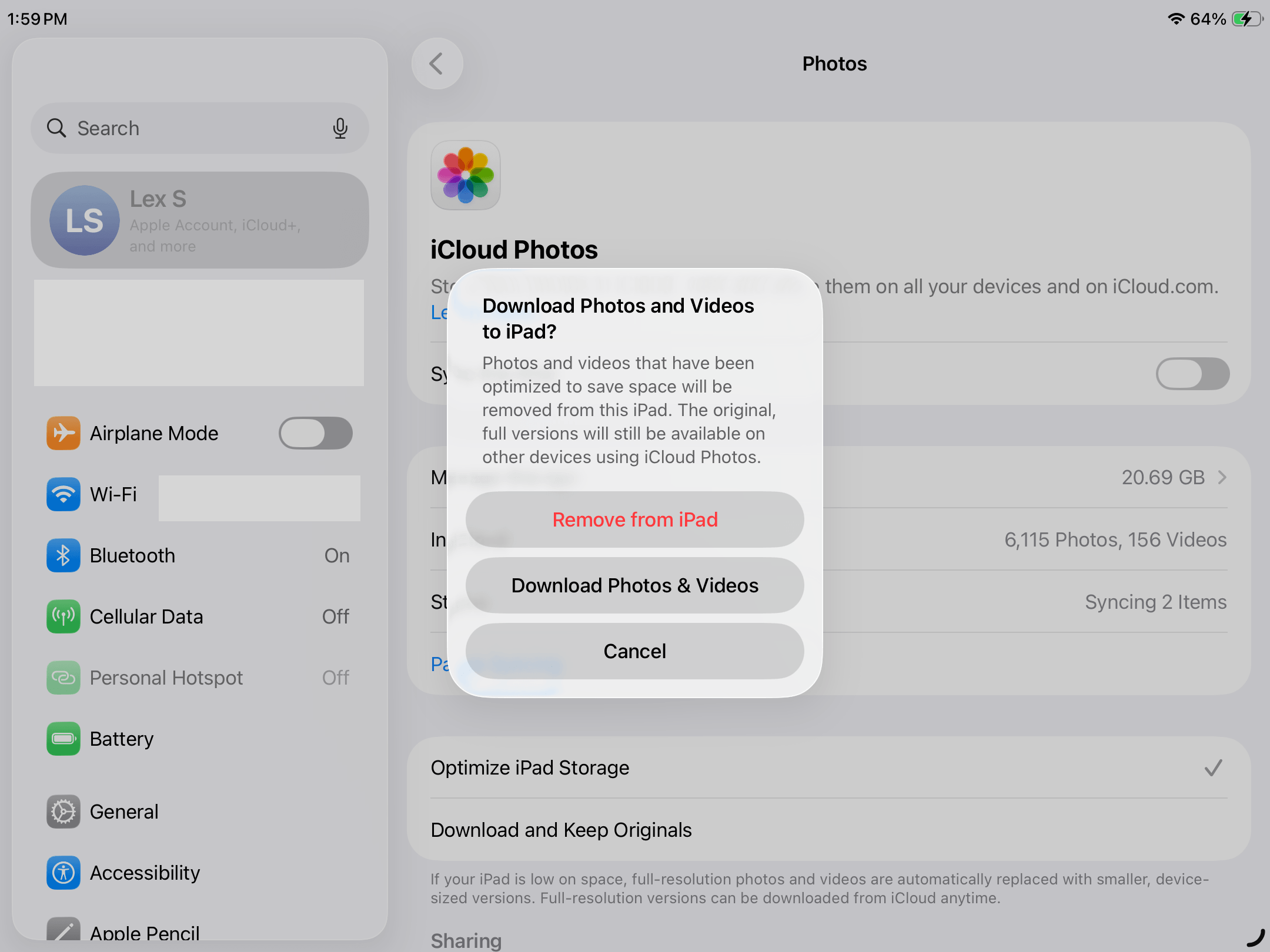 Dialog for downloading iCloud photos after disabling synchronization.