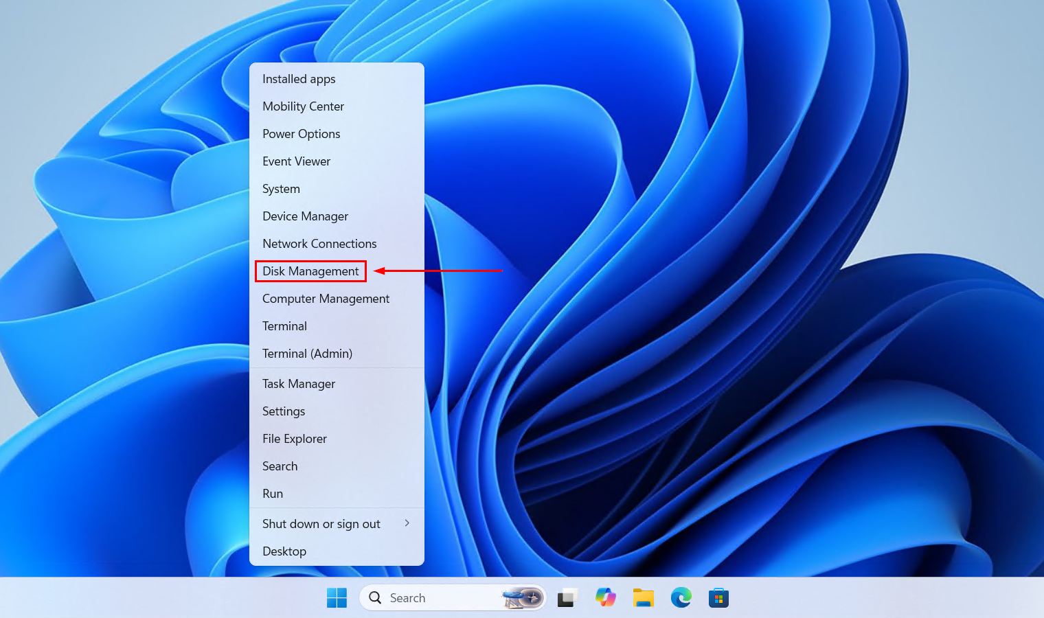 Opening Disk Management from the Start menu.