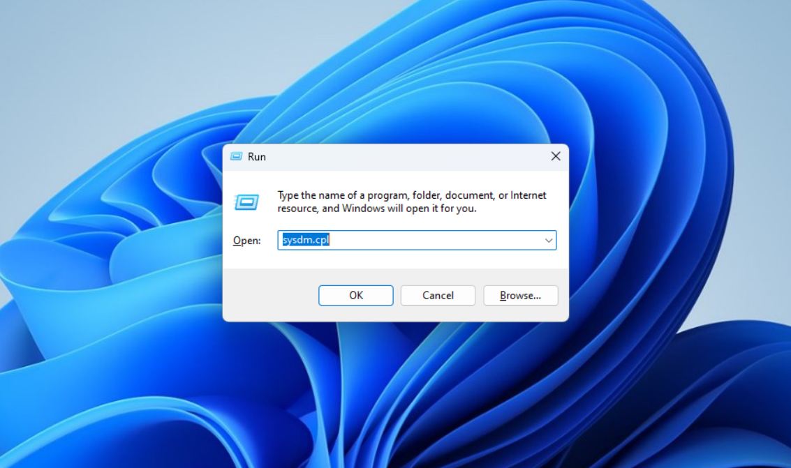 Running sysdm.cpl from the Run box.