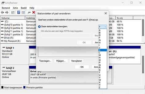 Een nieuwe stationsletter toewijzen